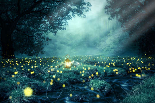 a landscape lit up with fireflies